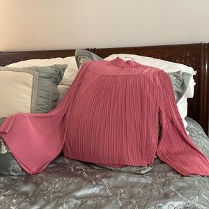 Made by A.L.C.  Pleated  , with exaggerated long sleeves.  Classic